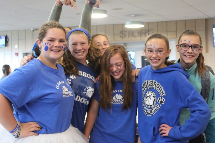 Emily Hietala, Samantha Dedos, Kaleigh Guertin, Liberty Farry, Samantha Tucker, Taylor Dolan, and Candace Sumner showing their grins for bulldogs.