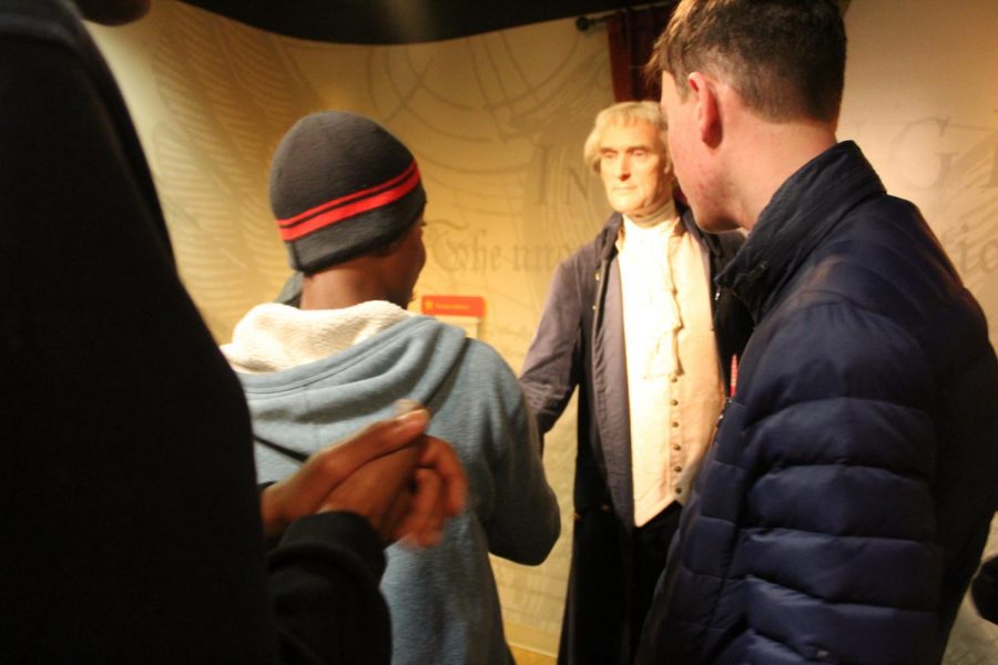 Students look at a wax figure of Thomas Jefferson at Madame Tussauds