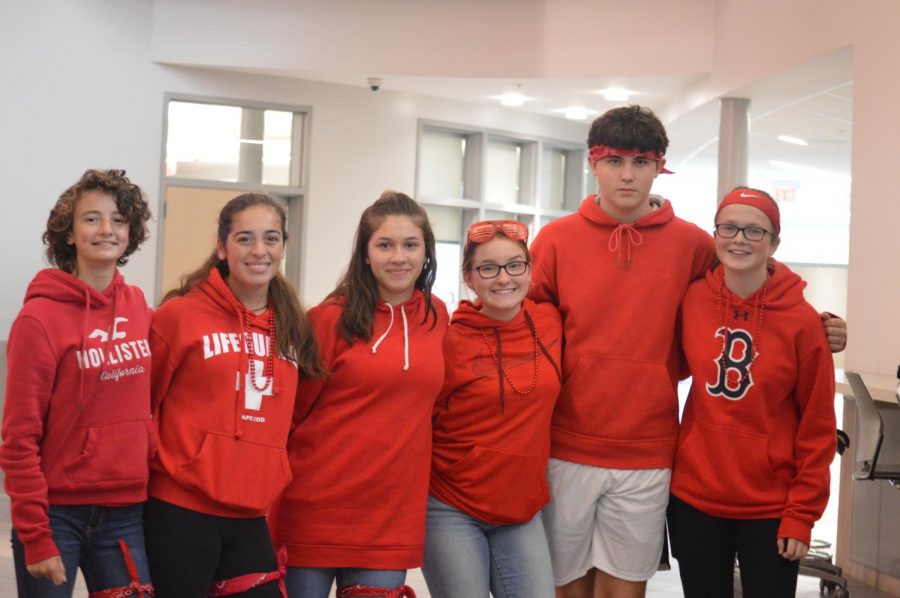 9th graders showing off their red for Wash-out Wednesday. 