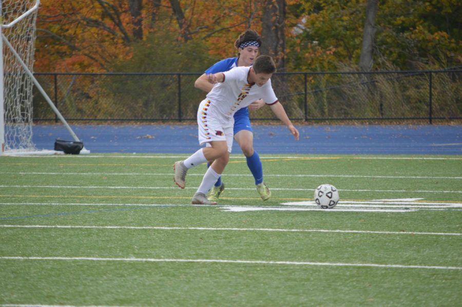 Will Haney battles for the ball