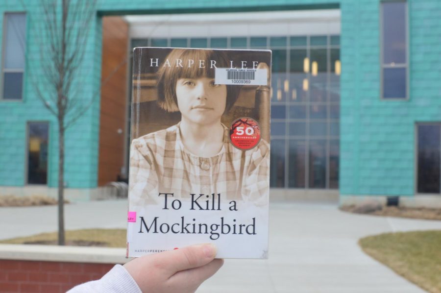 The popular 1960s classic, "To Kill a Mockingbird", is presented in front of the school. 