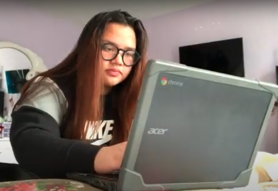 Stacey Domingo attends her online classes early in the morning.
