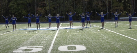 The cheer team performing at the pep rally.