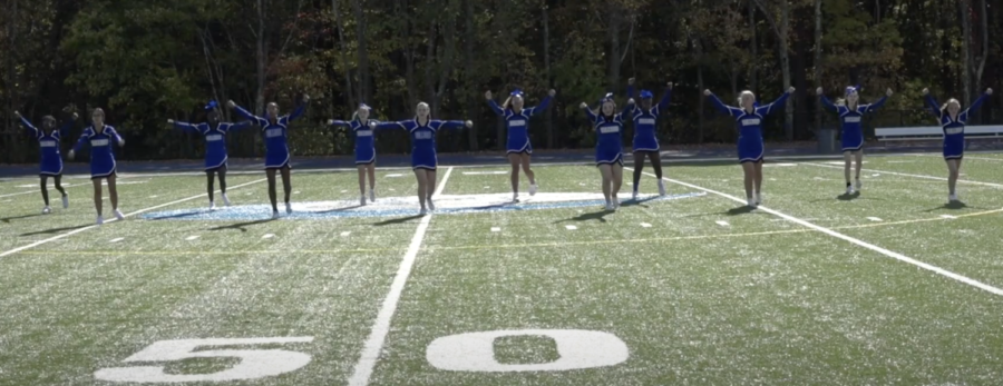 The+cheer+team+performing+at+the+pep+rally.