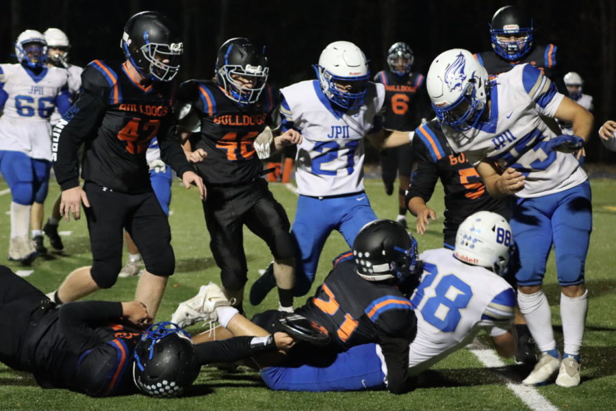 Rolens St. Jean takes down #88 during the 4th quarter