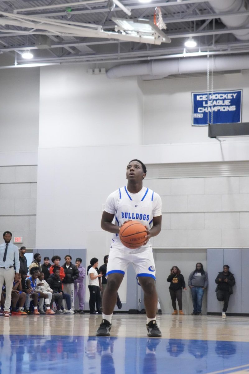 Josiah King (PG) shooting a free throw. 